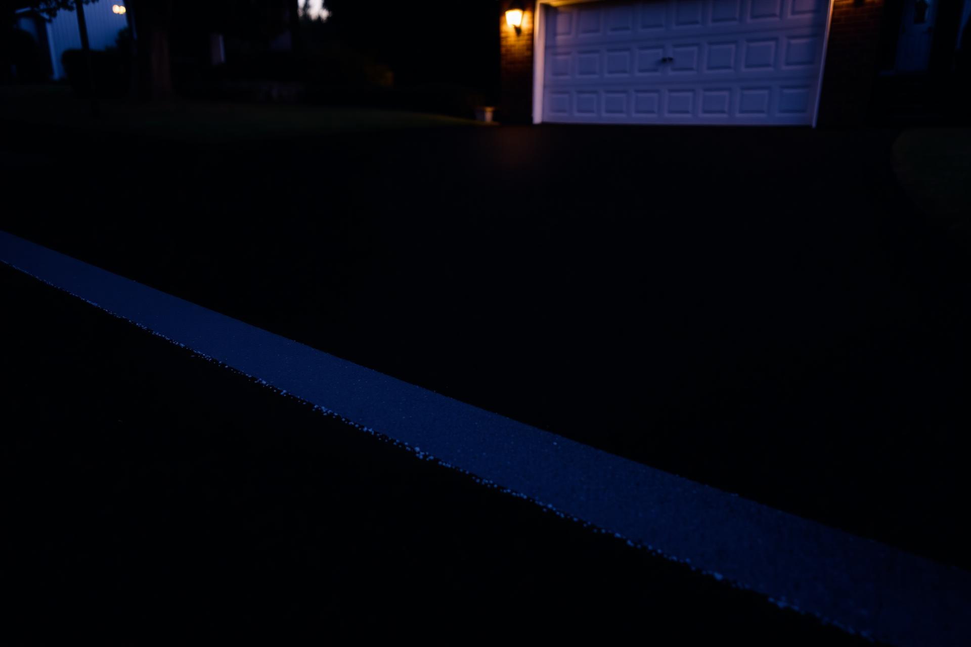 Freshly sealcoated asphalt driveway in Central Ohio